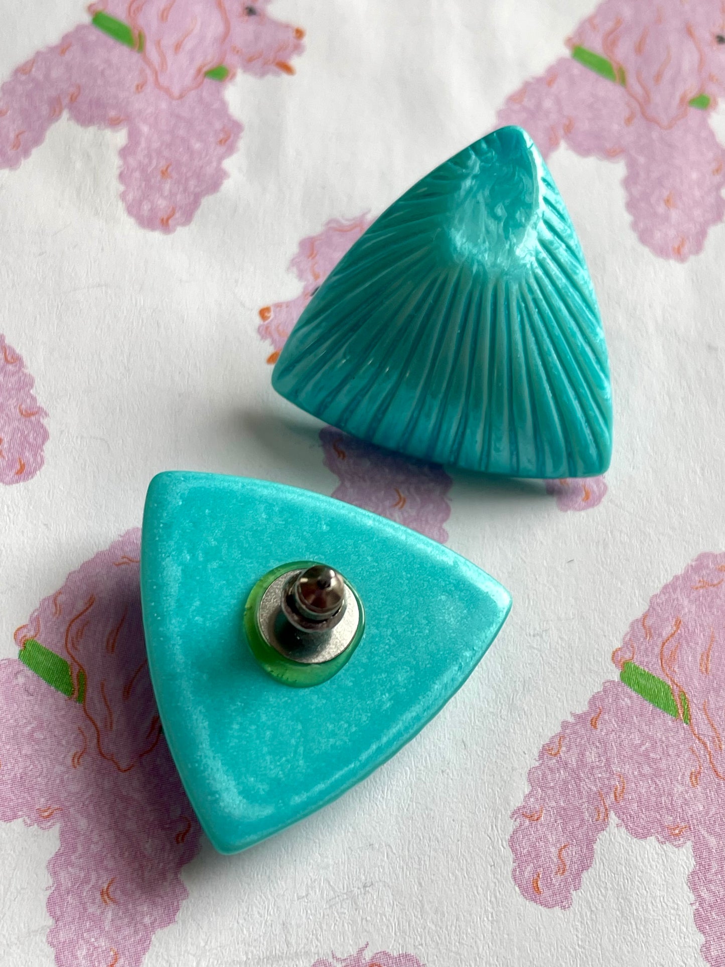 Turquoise driehoek stekers