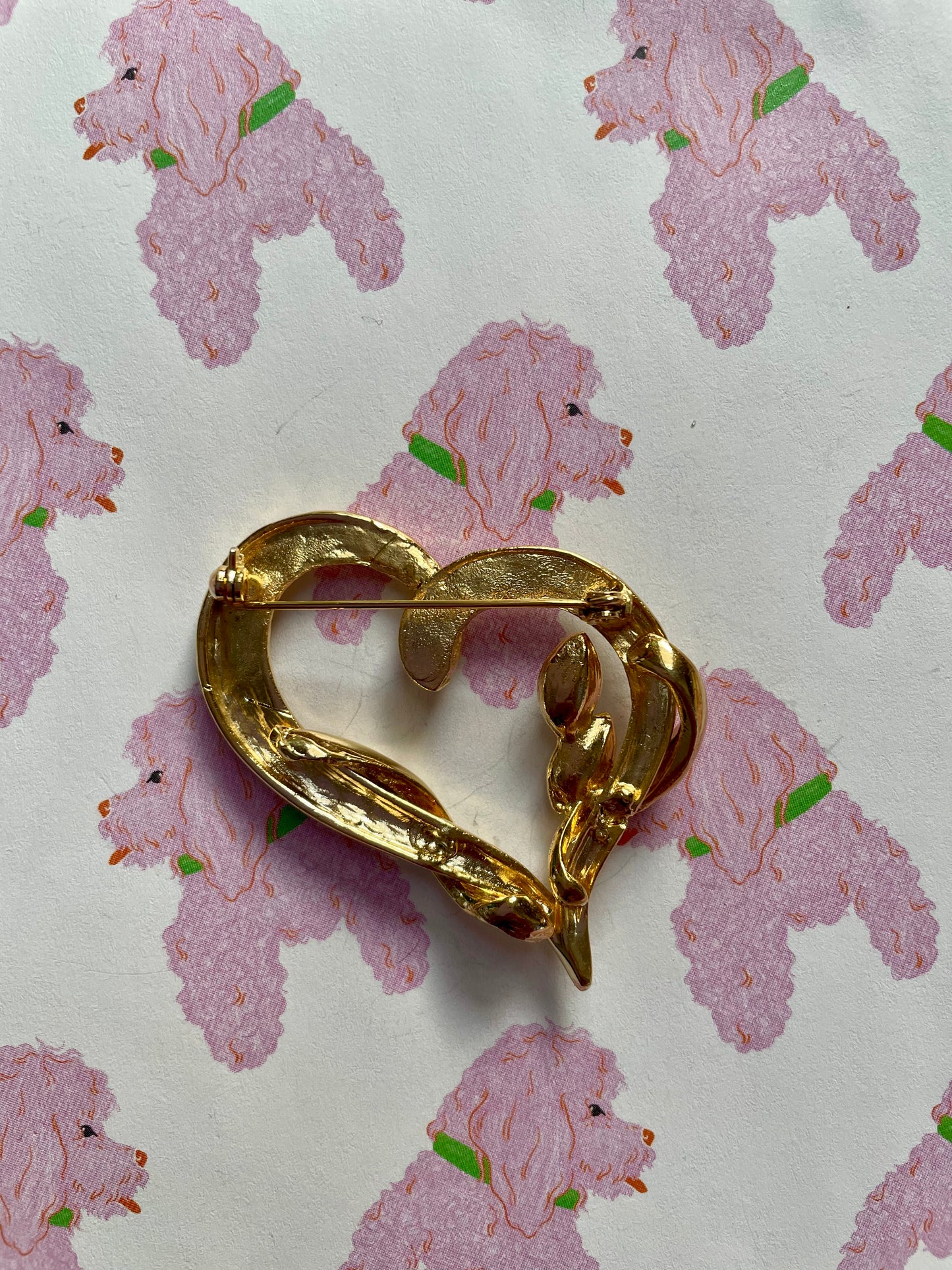 Vergulde hartjes broche