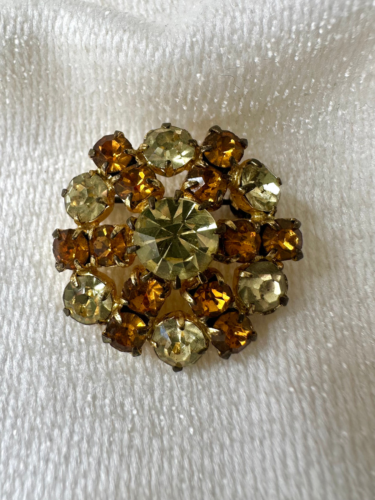 Vintage ronde broche met amberkleurige strass - S
