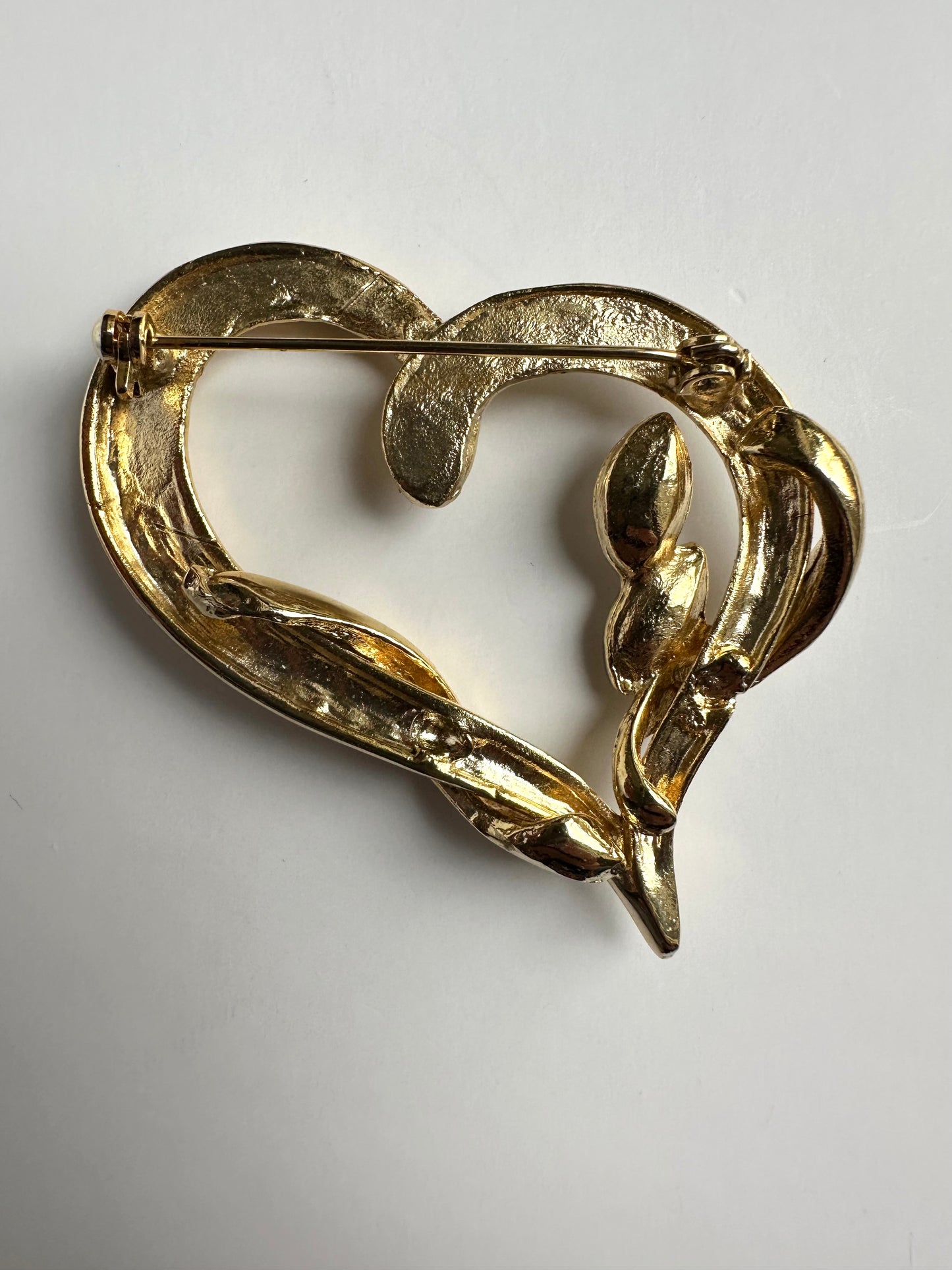 Vergulde hartjes broche