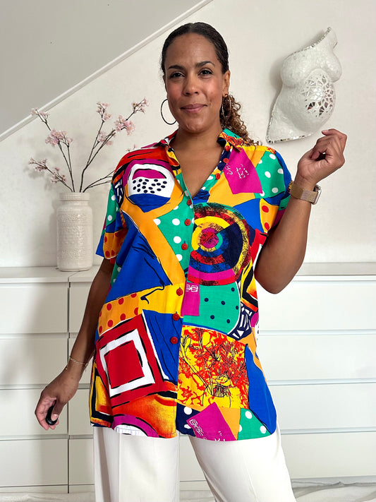 Vintage blouse met felle kleuren en drukke print in abstracte vorm 