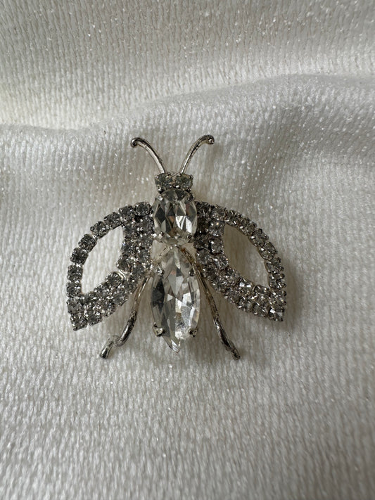 Vintage zilverkleurige sprinkhaan broche met strass