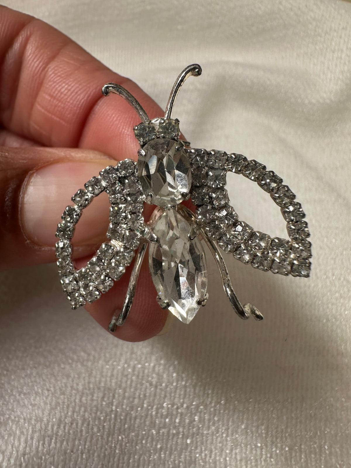 Vintage zilverkleurige sprinkhaan broche met strass
