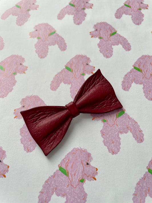 Strik broche bordeux rood