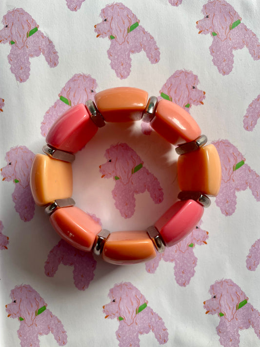 Zalm- en koraalroze armband