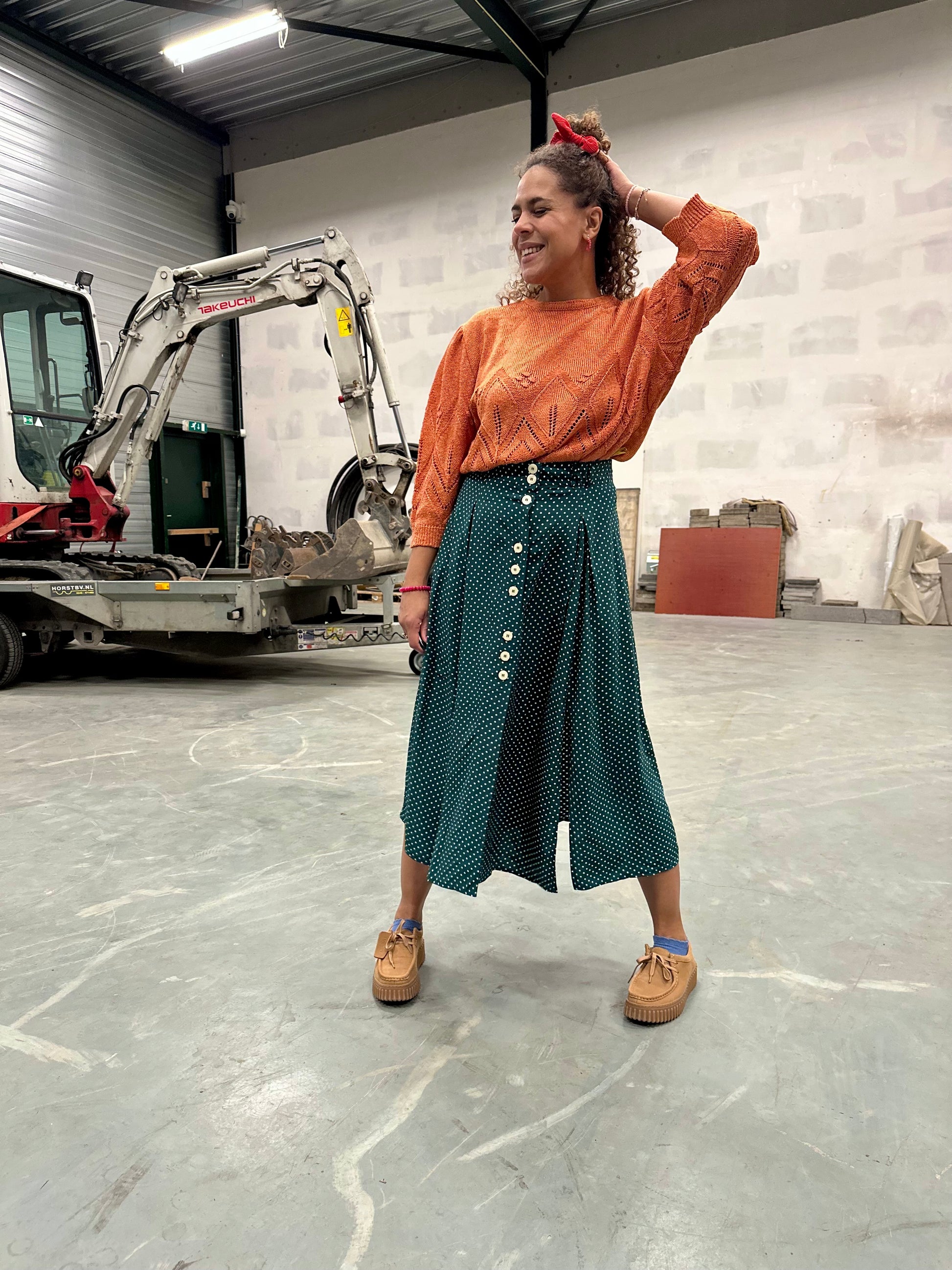 Vintage rok in donkergroen met polka dot print