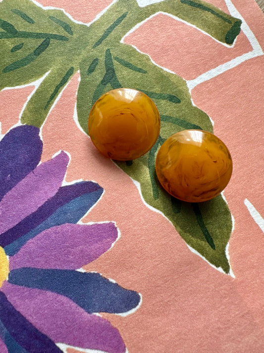 Vintage epoxy clip-oorbellen in oranje
