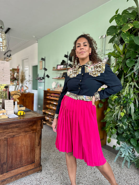 Vintage plooirok in fuchsia roze, midi lengte