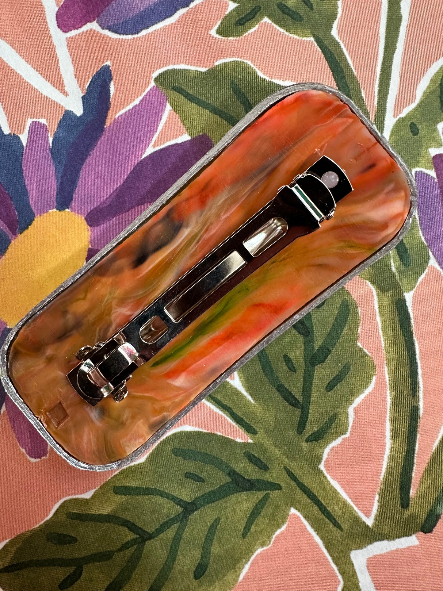 Vintage haarspeld in oranje tinten met goud en abstracte print