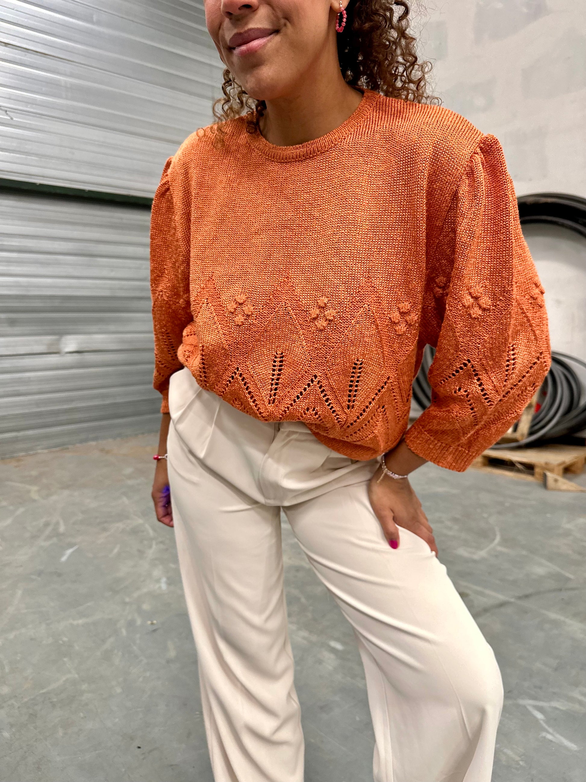 Vintage gebreide trui met driekwartmouwen in abrikoos kleur