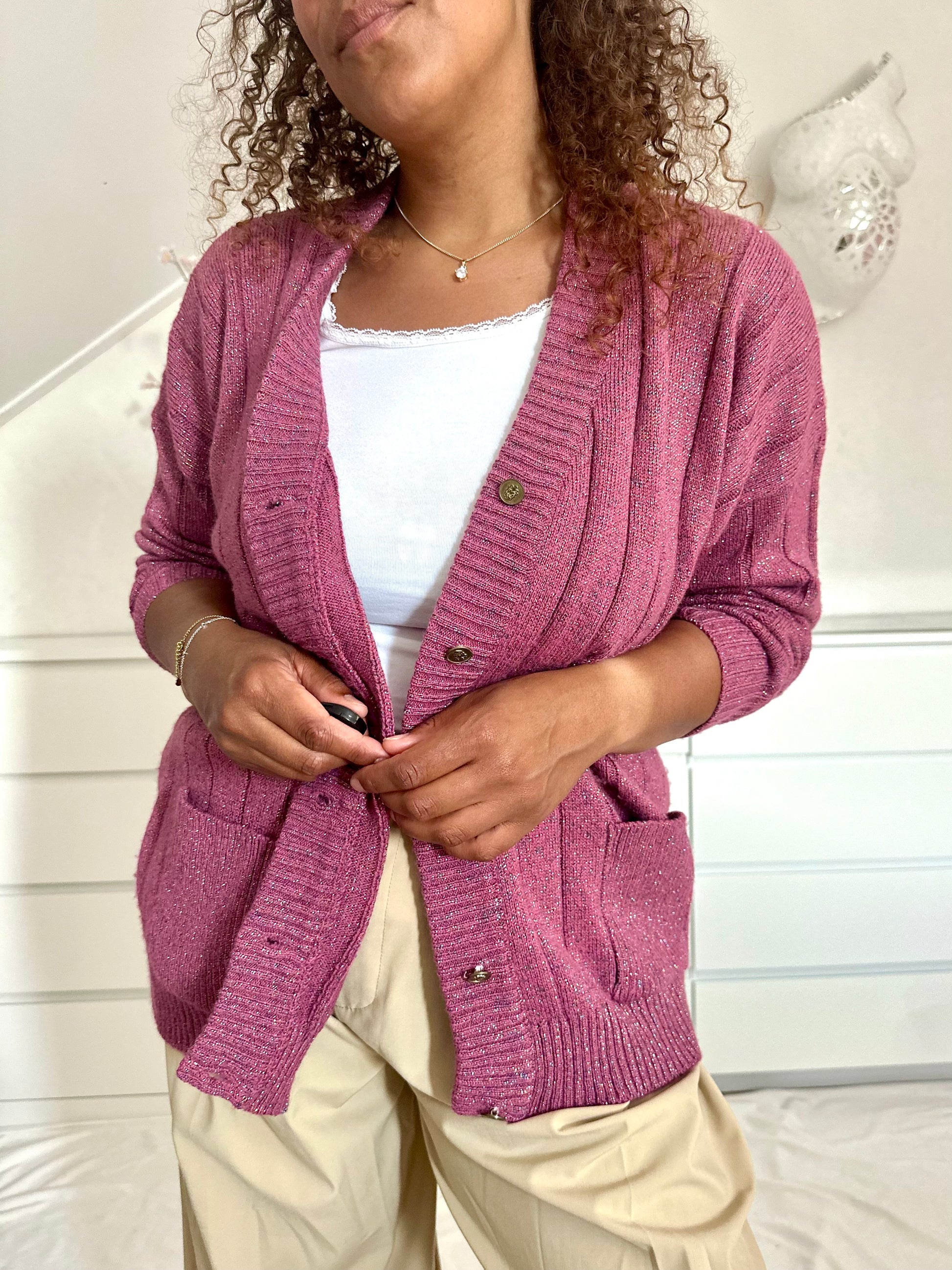 Vintage vest met verticaal breipatroon in roze kleur met glitterdraad